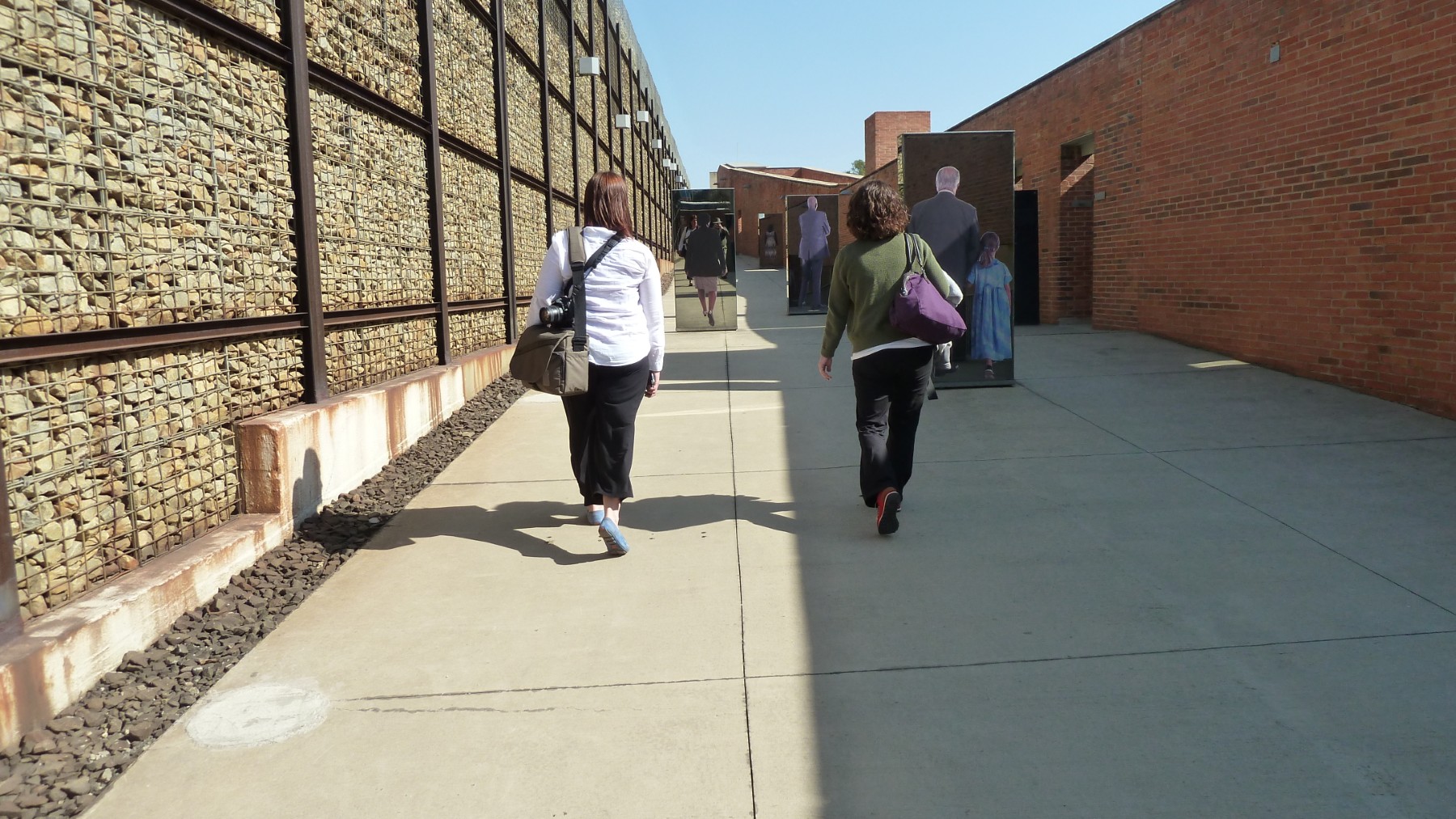 Amy and Erin strolling along the Journeys exhibit.